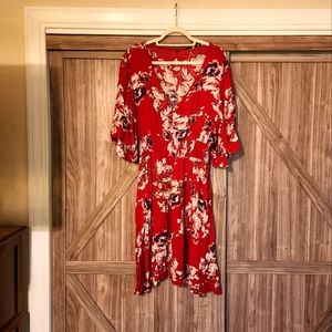 Size XXL vibrant red dress with floral pattern.